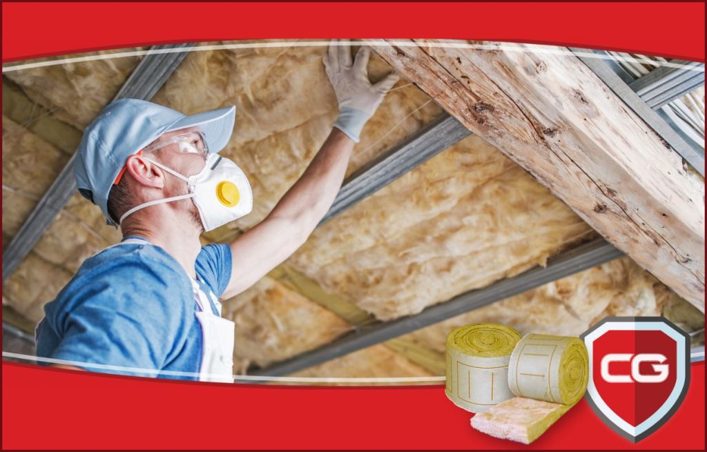 This is an image of an HVAC technician installing insulation in an attic